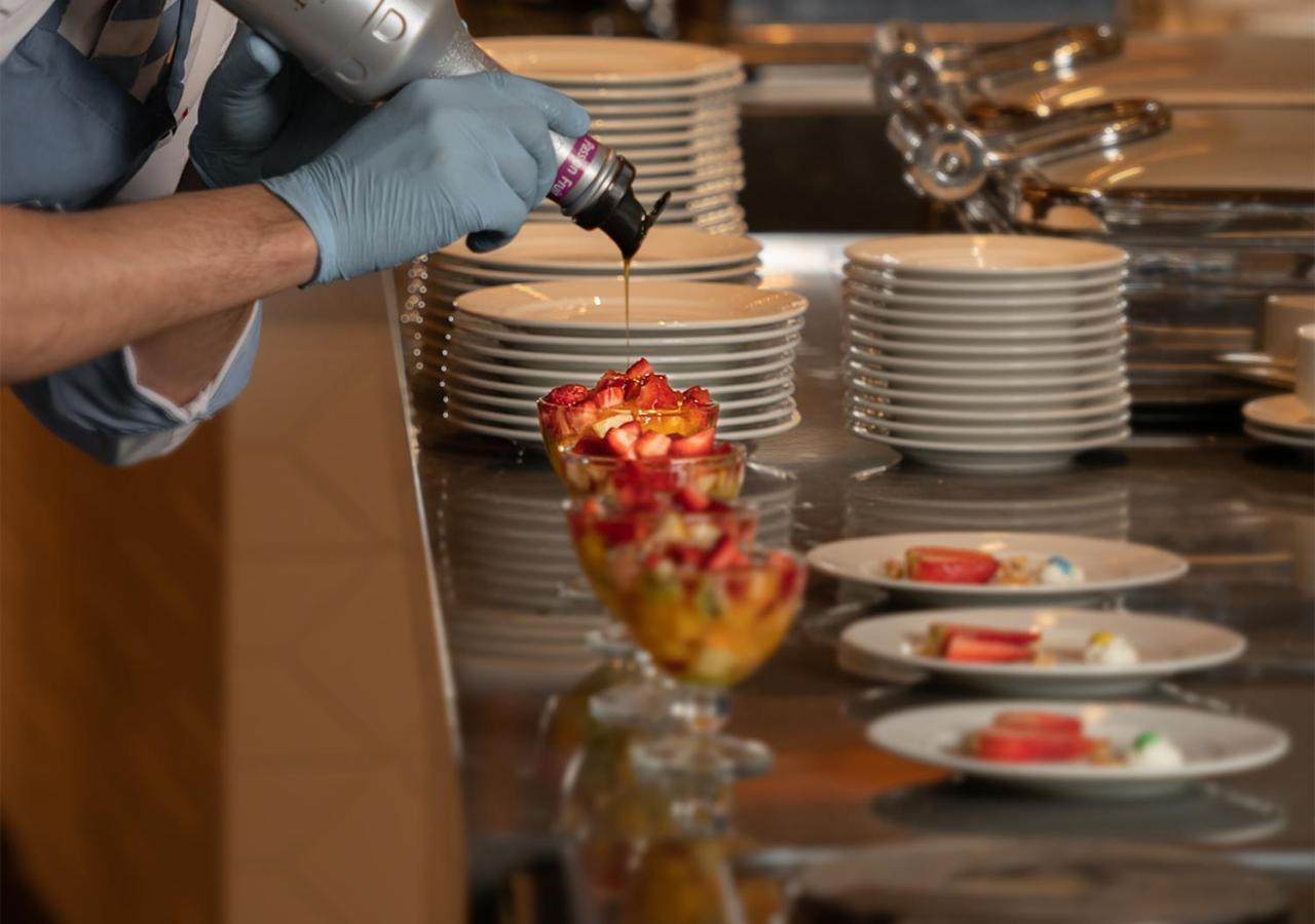 Crystal Inn Hotel - Alamein (Adults Only) Ελ Αλαμέιν Εξωτερικό φωτογραφία A pastry chef finishing a dessert